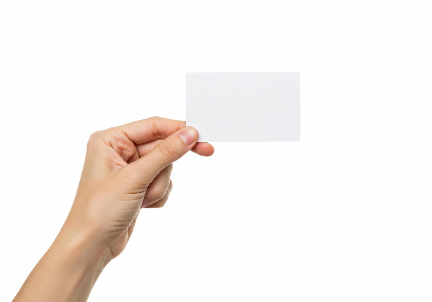 A person holding a blank card in their hand photo