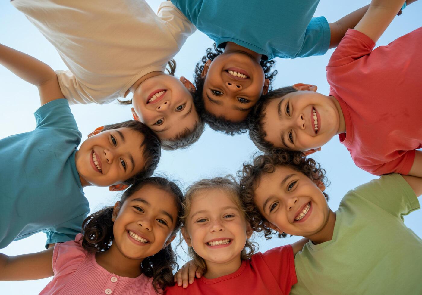 Group of children standing in a circle photo