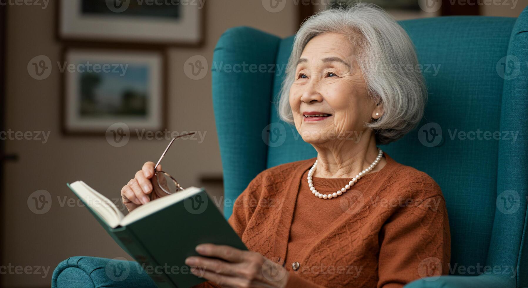 An older woman reading a book photo