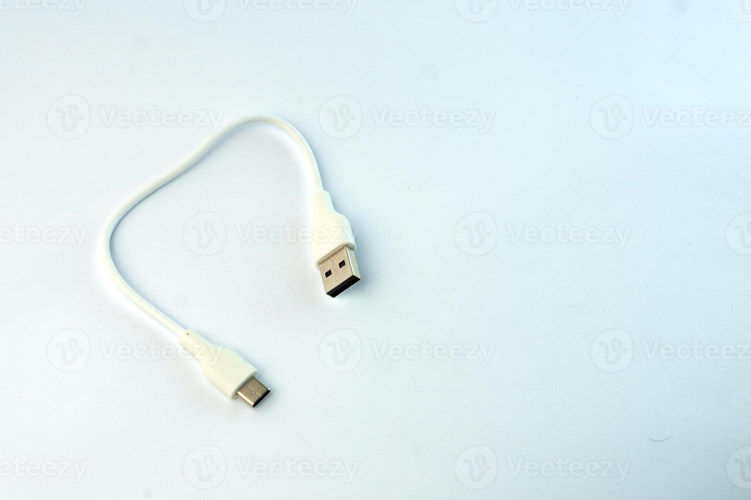 White USB to Micro USB cable for fast charging and data transfer. Compact and durable, ideal for smartphones, tablets, power banks, and other electronic devices photo