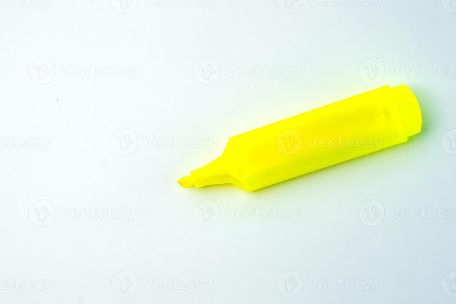 A yellow highlighter pen with a chisel tip for smooth, precise marking. Perfect for students, office work, and note-taking. Fast-drying, smudge-proof, and long-lasting ink. photo