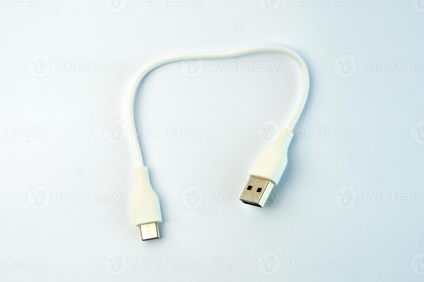 A White USB to Micro USB cable for fast charging and data transfer. Compact and durable, ideal for smartphones, tablets, power banks, and other electronic devices photo