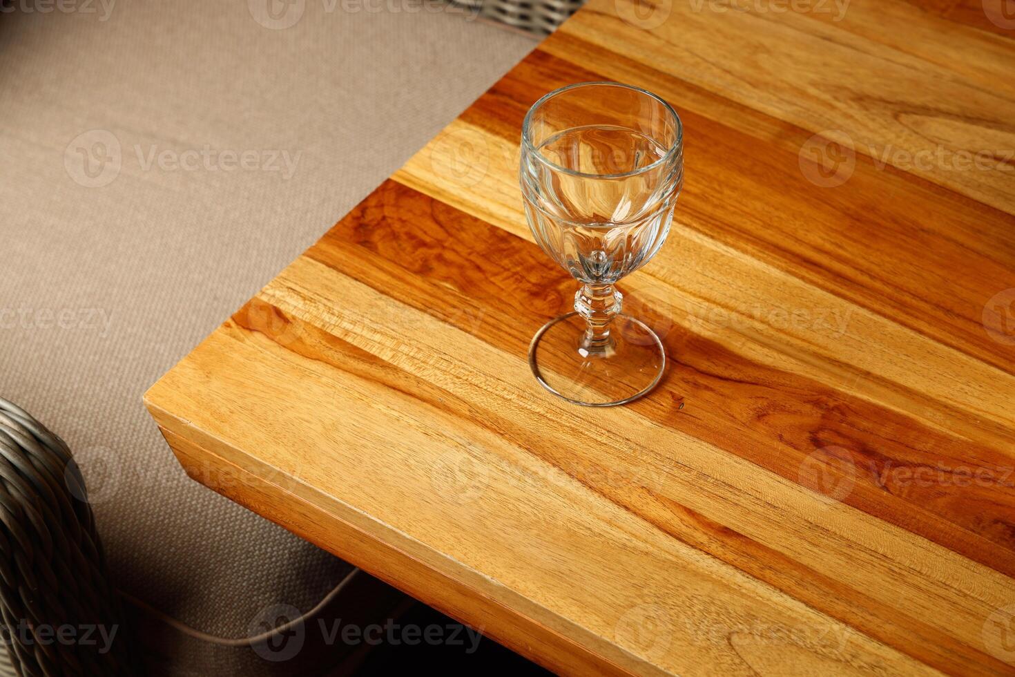 An Elegant Glass Set Beautifully Placed on a Wooden Table Creates a Stunning Display photo