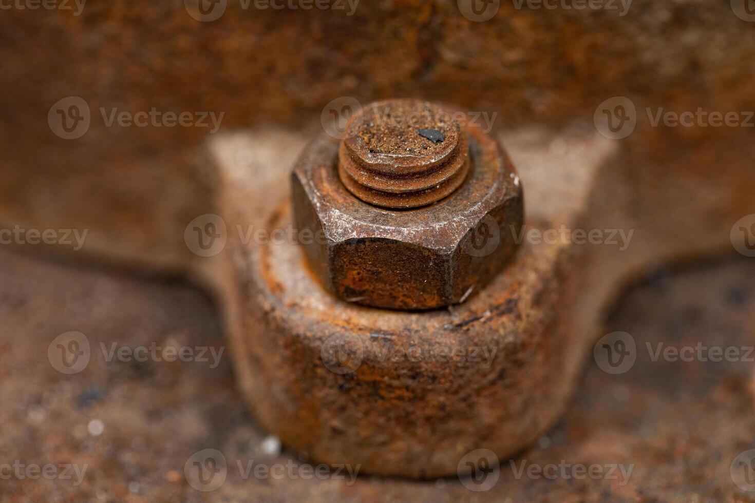 Rusty bolt and nut close-up. Shallow depth of field. photo