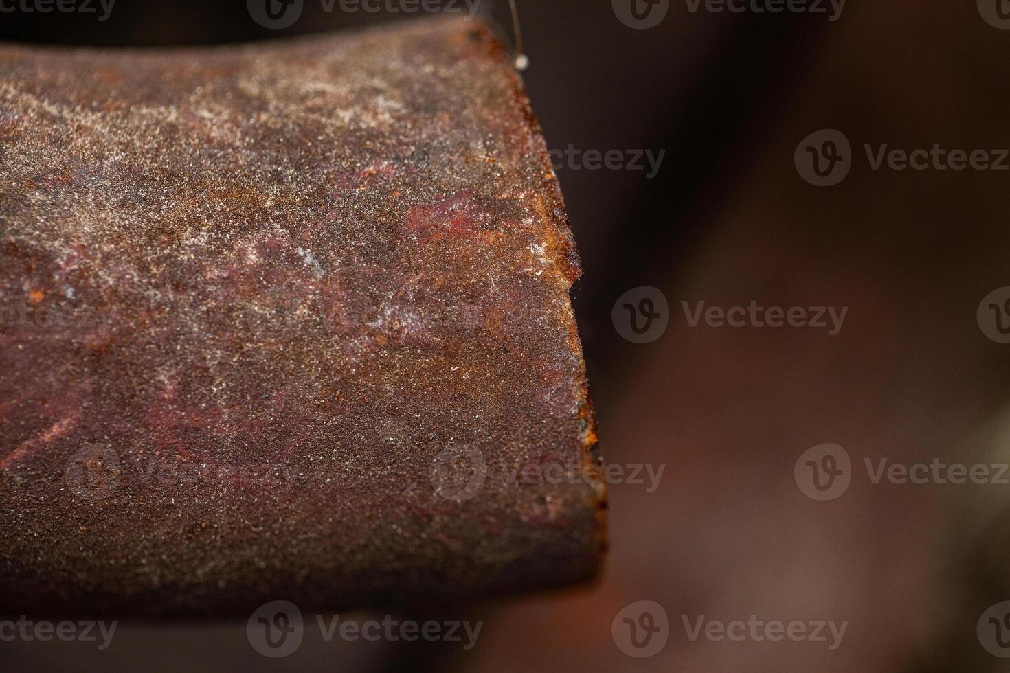Close-up of a rusty metal pipe with severe corrosion photo