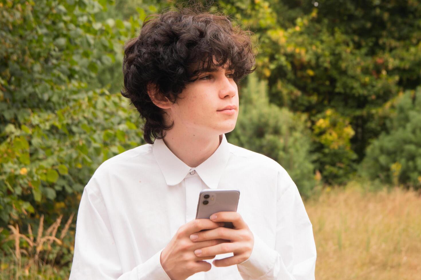 Man enjoying remote job outdoors photo