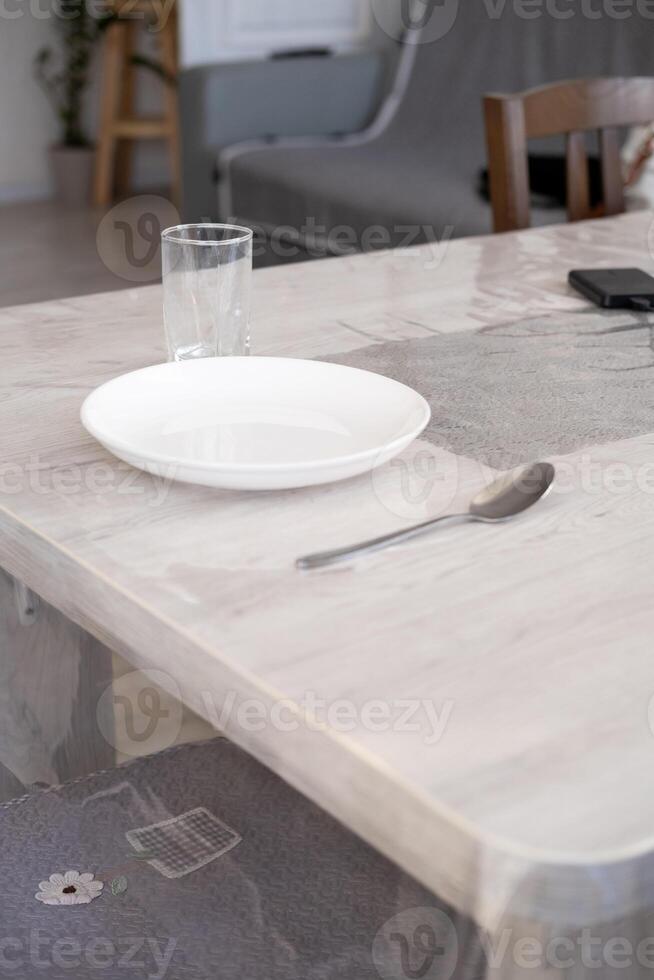 Serving a plate, on the table at home photo