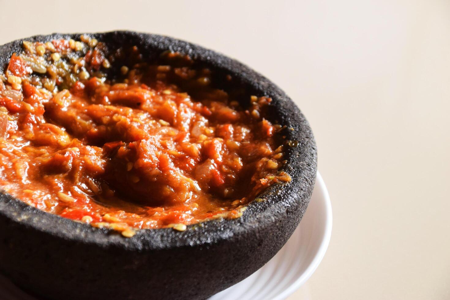 Close up of red chili tomato sambal with shrimp paste photo