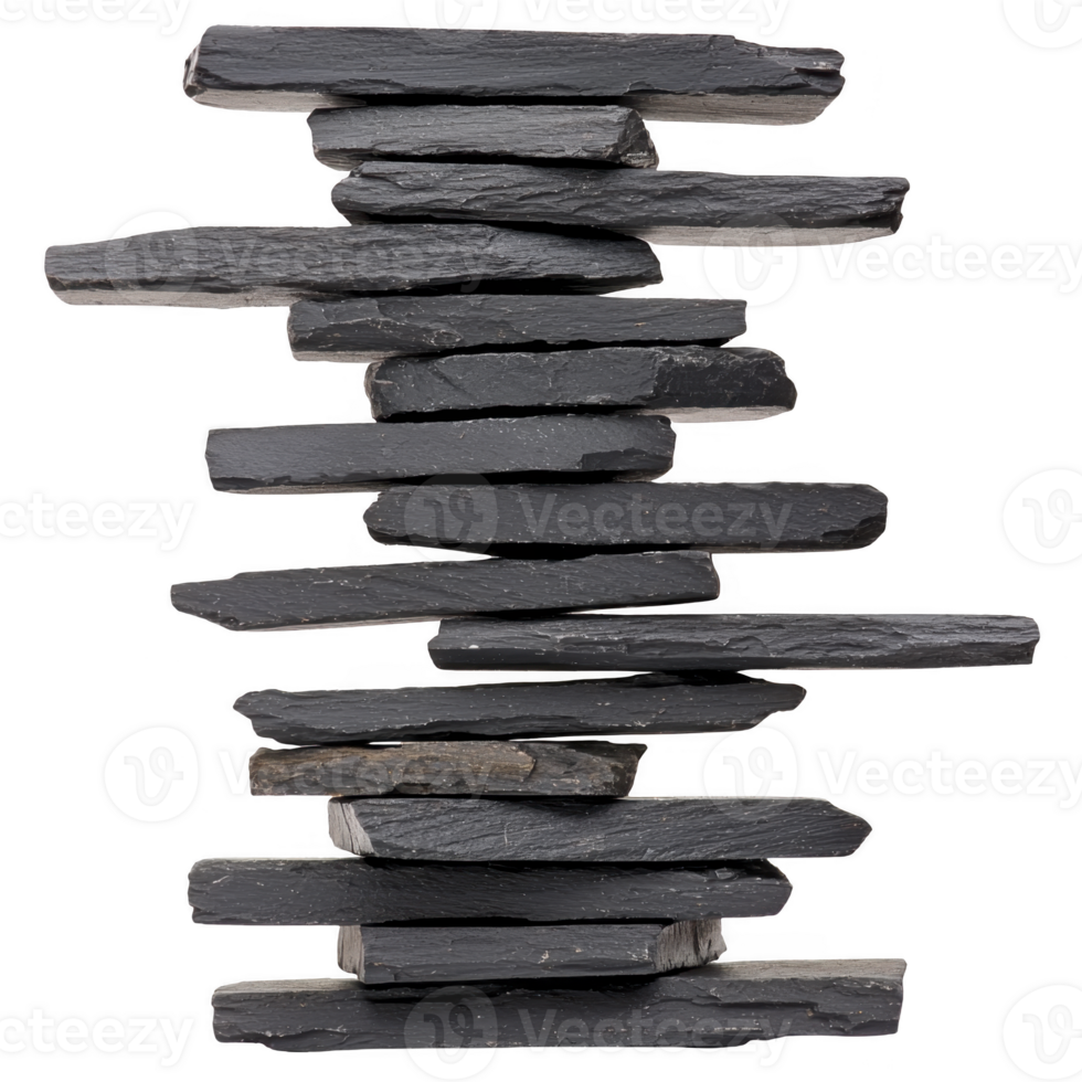 Stack of flat, dark gray slate stones is arranged vertically, creating balanced and natural structure. stones vary in size and texture, adding organic feel to composition png