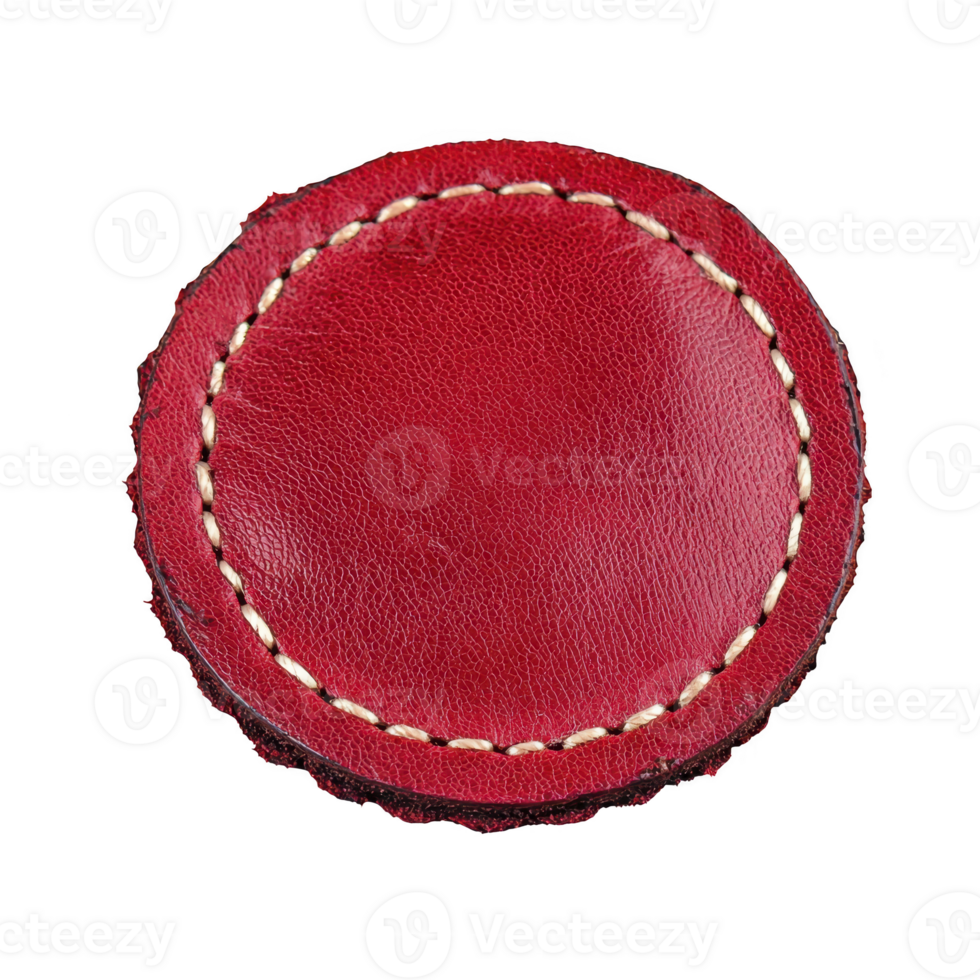 Round red leather patch with visible stitching around edges, showcasing textured surface. vibrant color and craftsmanship evoke sense of quality and style png