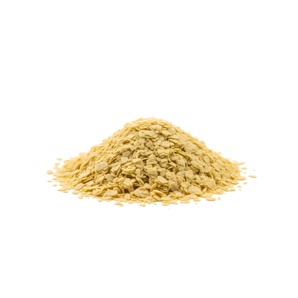 A pile of textured light yellow cereal flakes scattered on a black background isolated on transparent background png