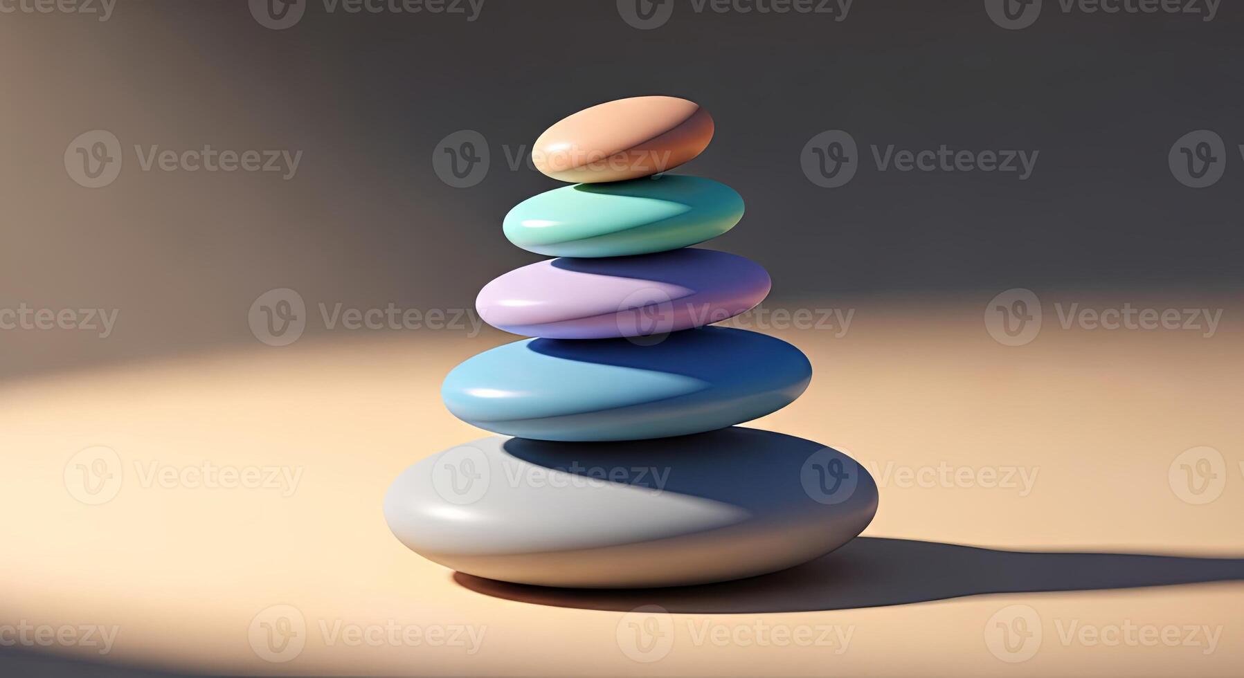Stack of smooth pastel colored stones balanced precariously on a light surface photo