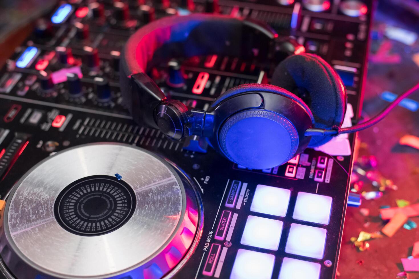 Dj equipment and headphones on a table photo
