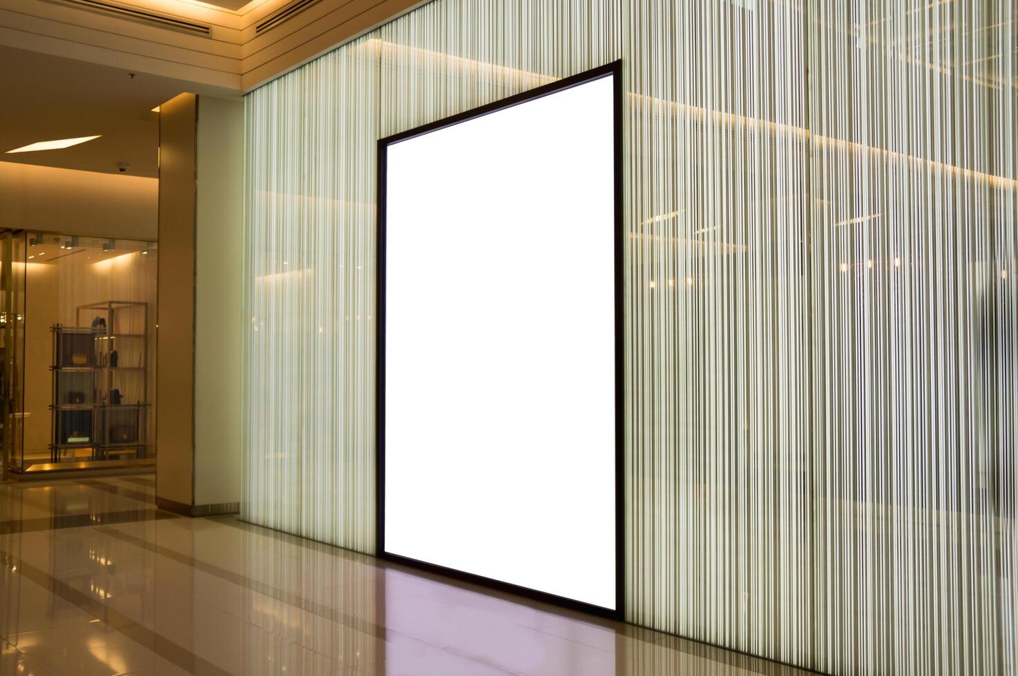 A large white blank screen in a lobby photo