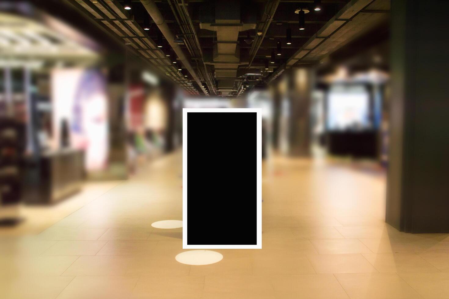 An empty black square in a shopping mall photo