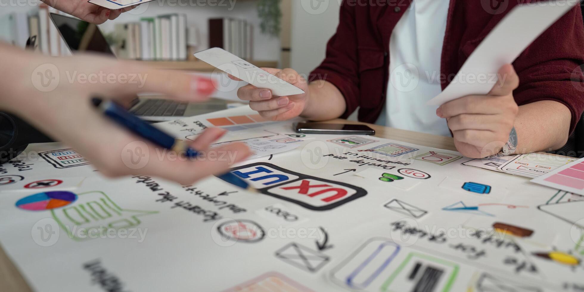 UX and UI design team reviewing project ideas. photo