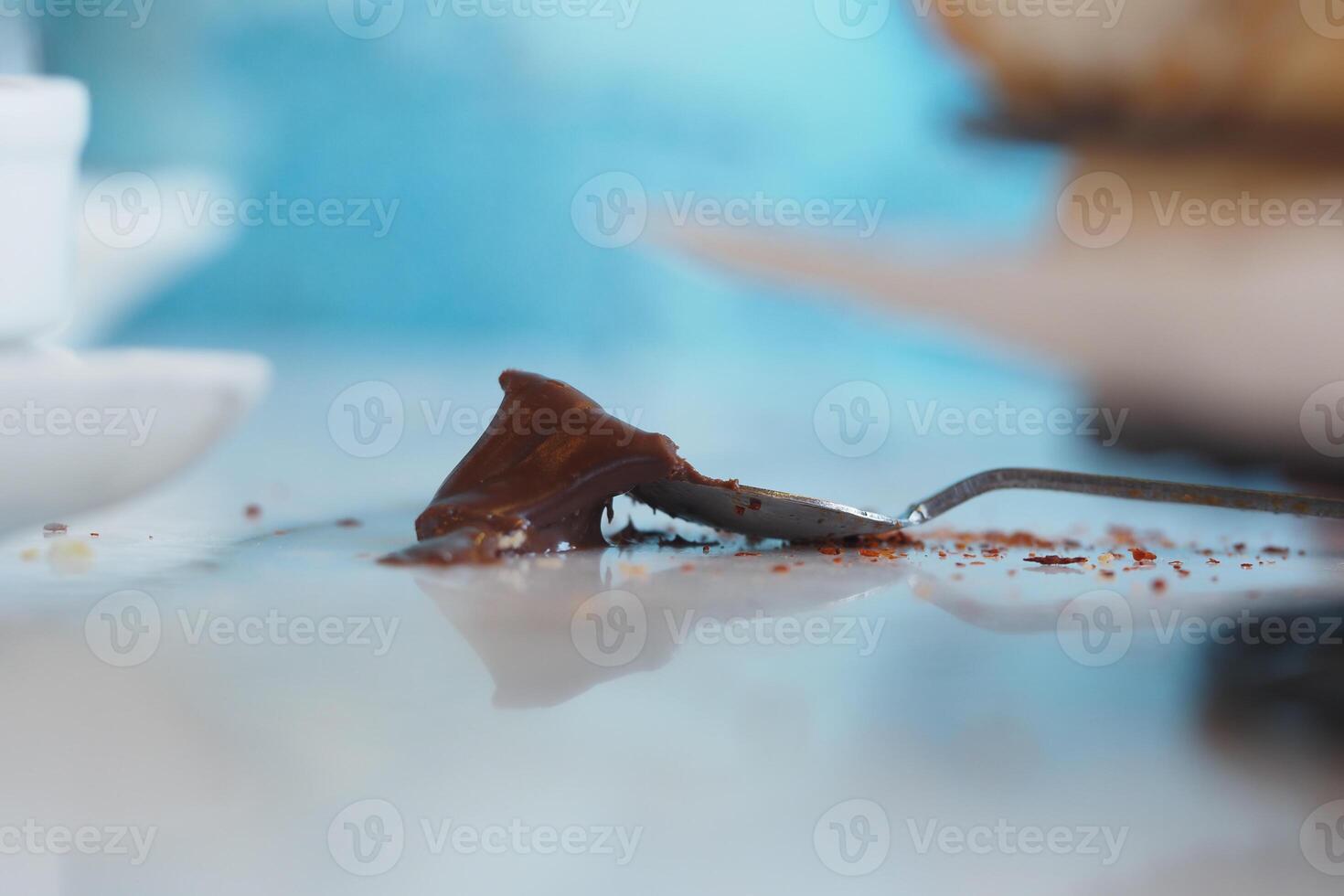 chocolate spilled on a table after a meal photo