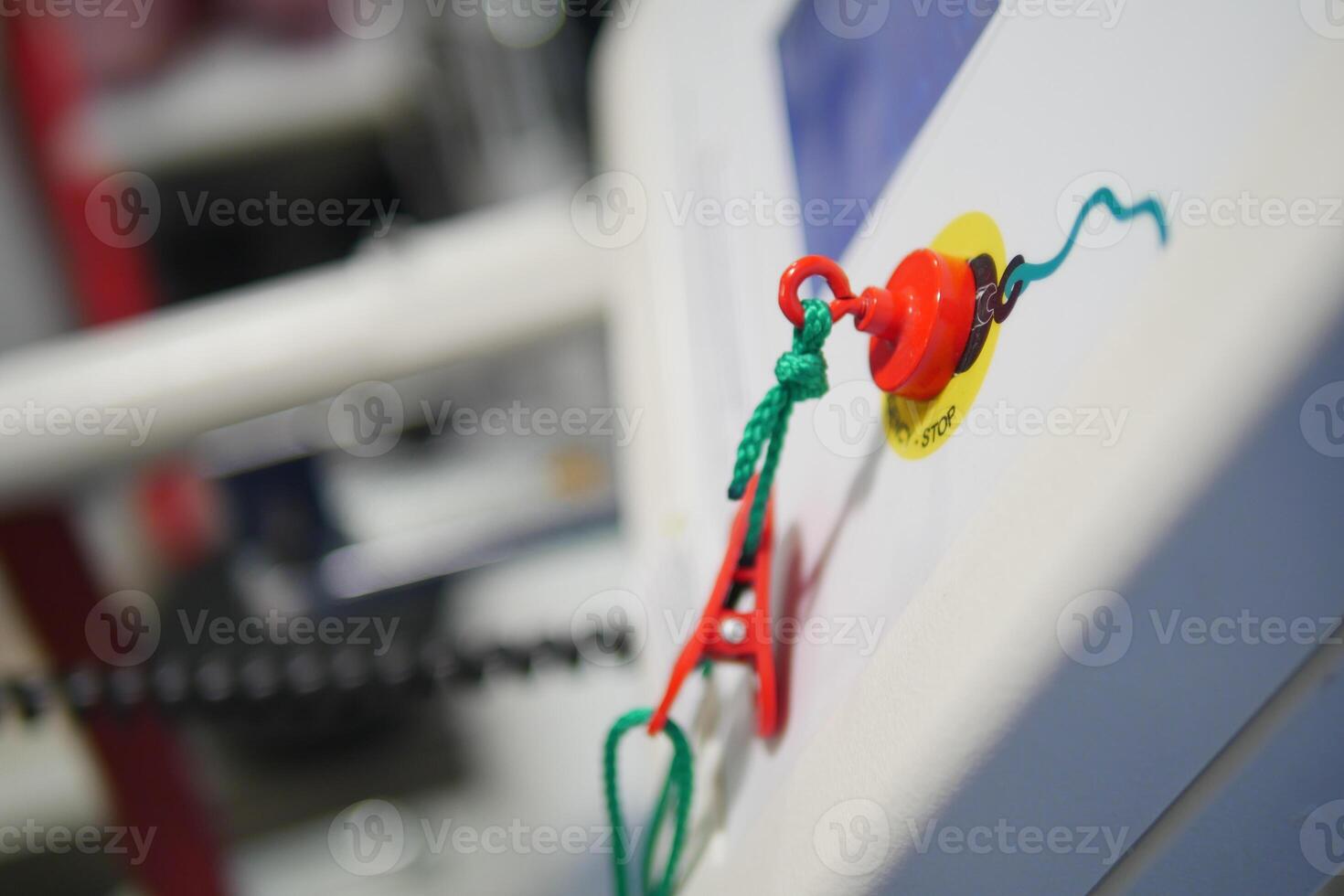 Safety cord attached to exercise equipment in gym area photo