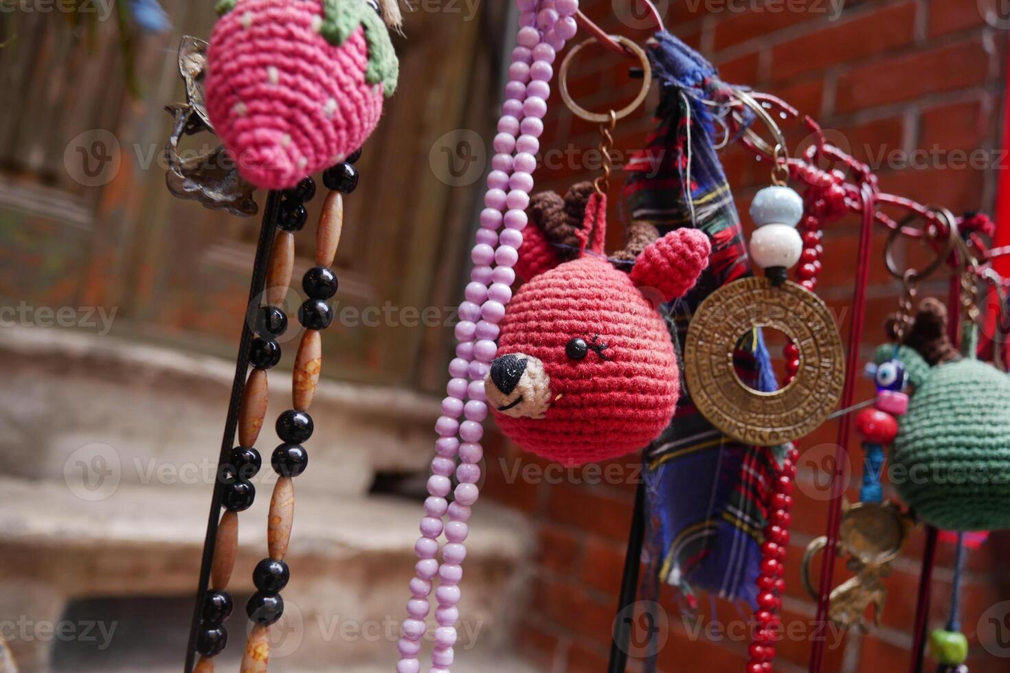 Colorful crafts displayed in a market during the afternoon photo
