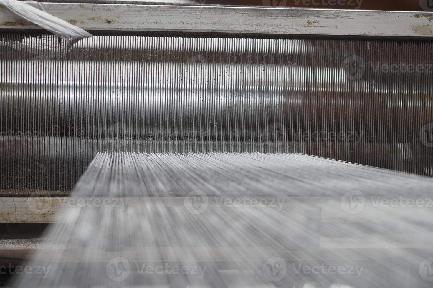 Textile weaving process in traditional workshop photo