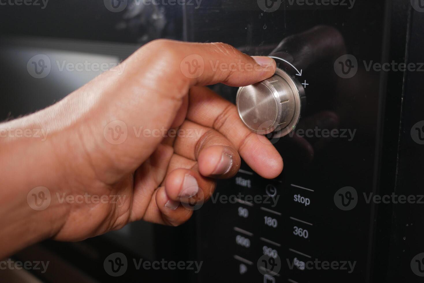 Adjusting microwave settings for cooking time photo