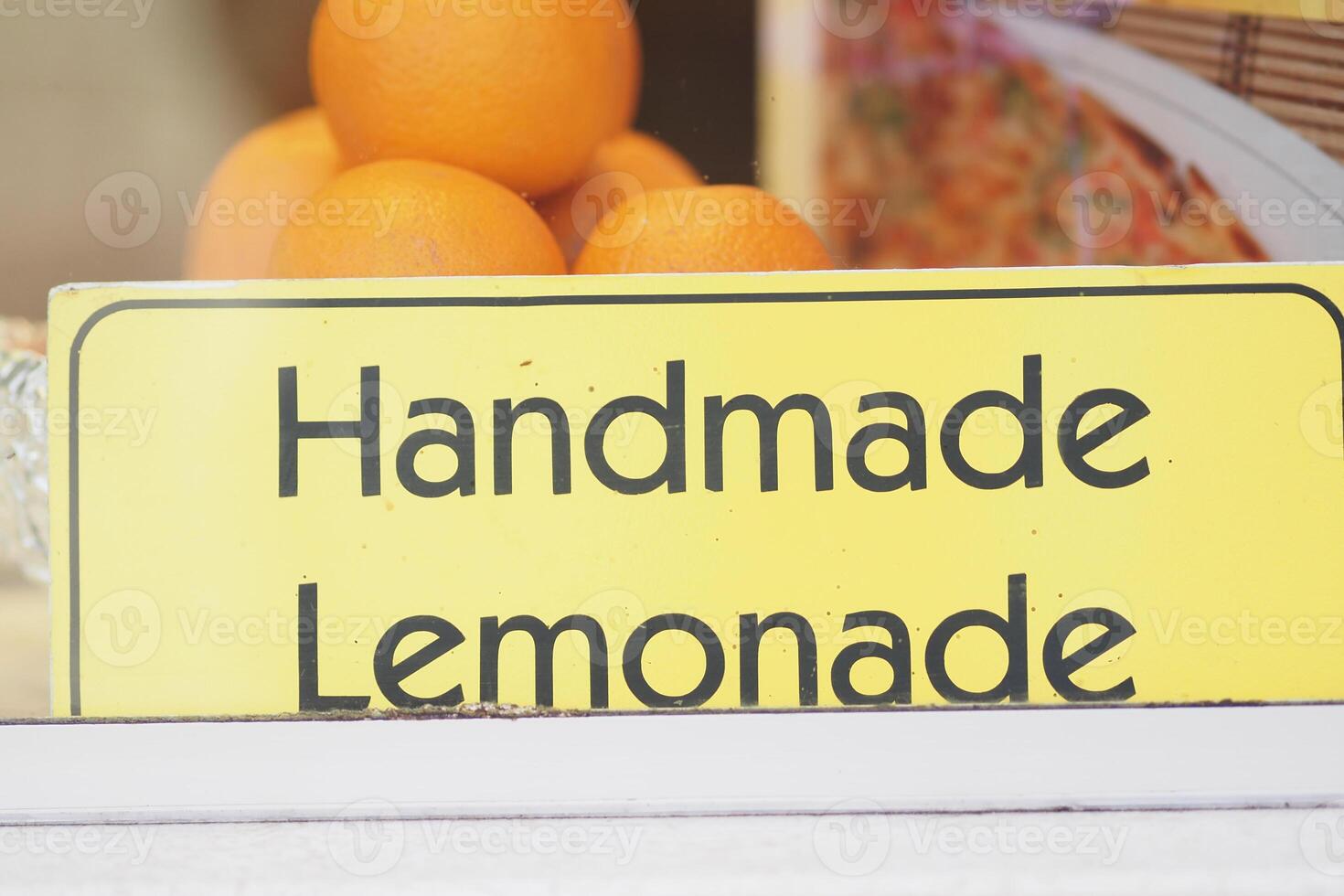 Refreshing handmade lemonade stand by vibrant oranges photo