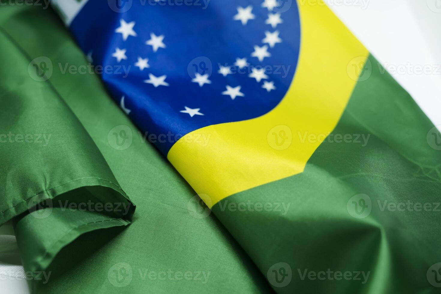 Close up of a Brazilian flag lying on the floor photo