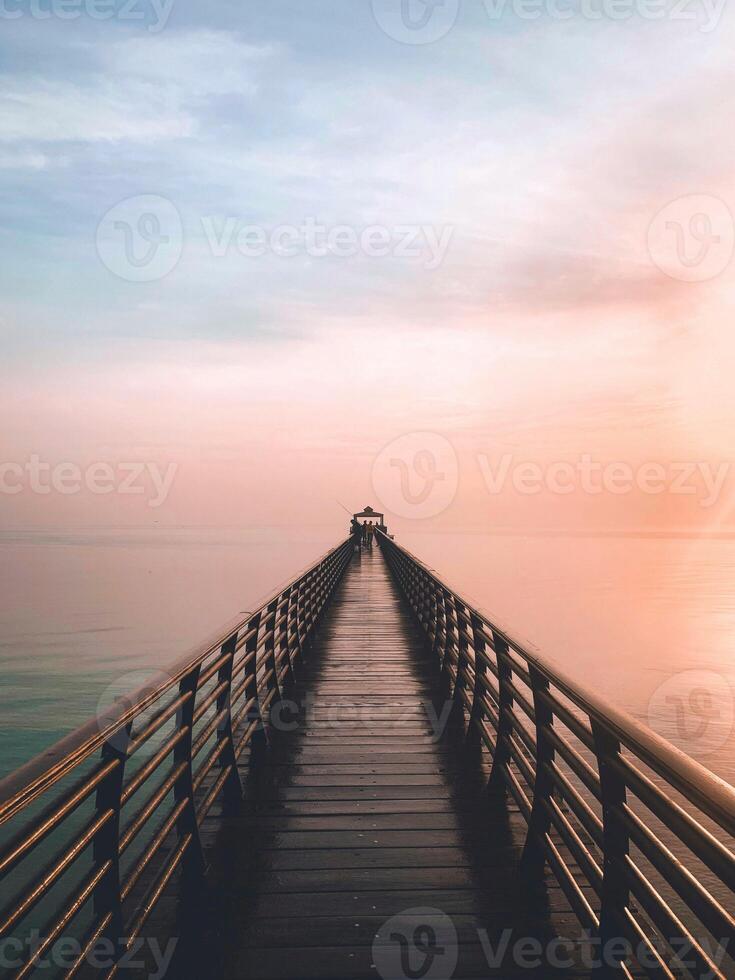 Serene Bridge into the Misty Horizon photo