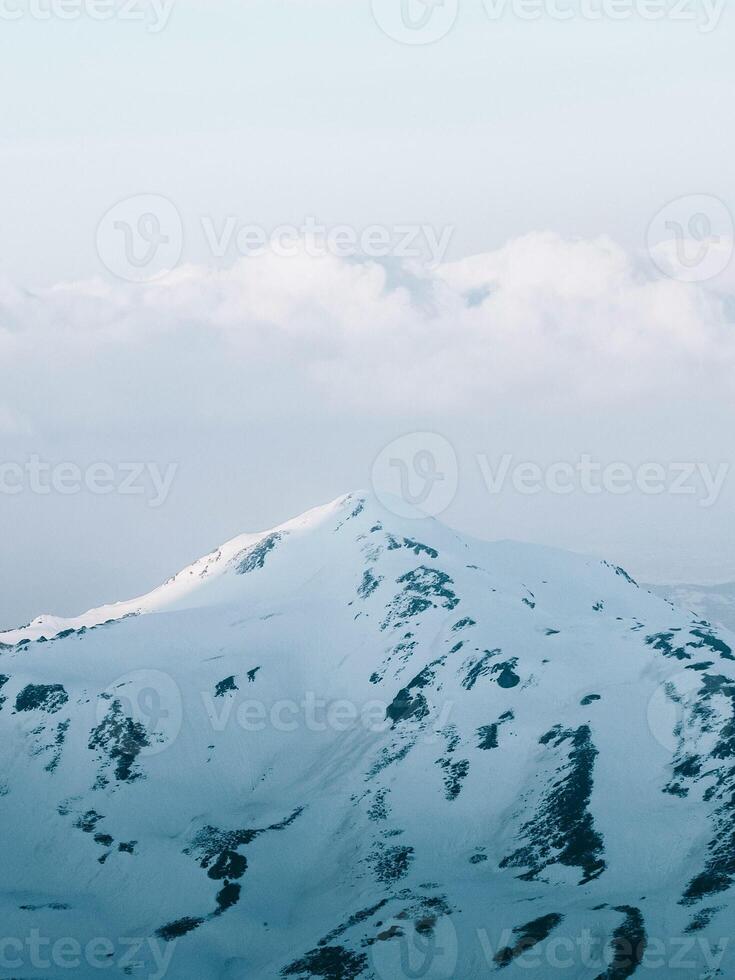 Snow Covered Mountain Peak photo