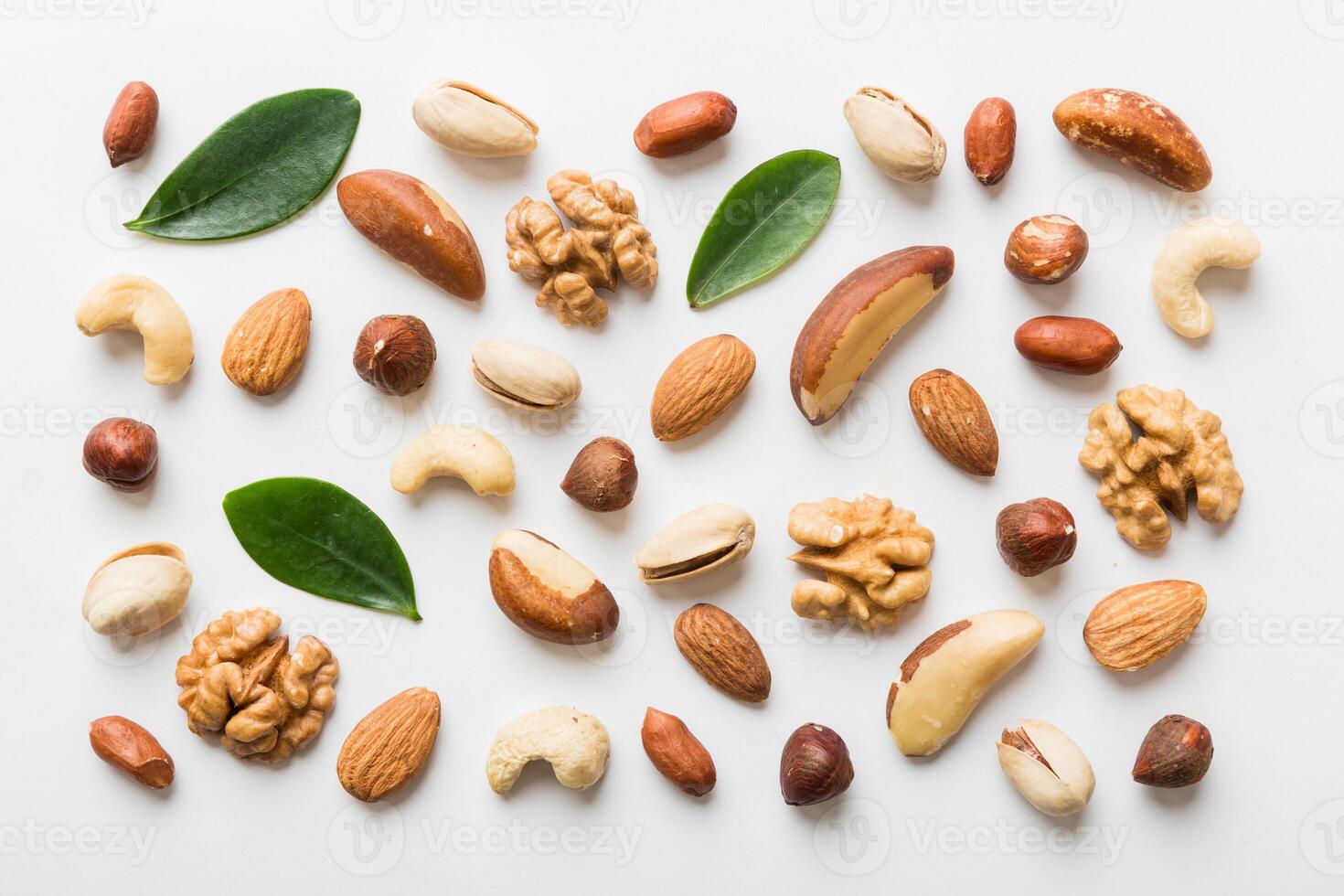 Composition of nuts , mix hazelnuts, cashews, almonds on table. healthy eating concepts photo