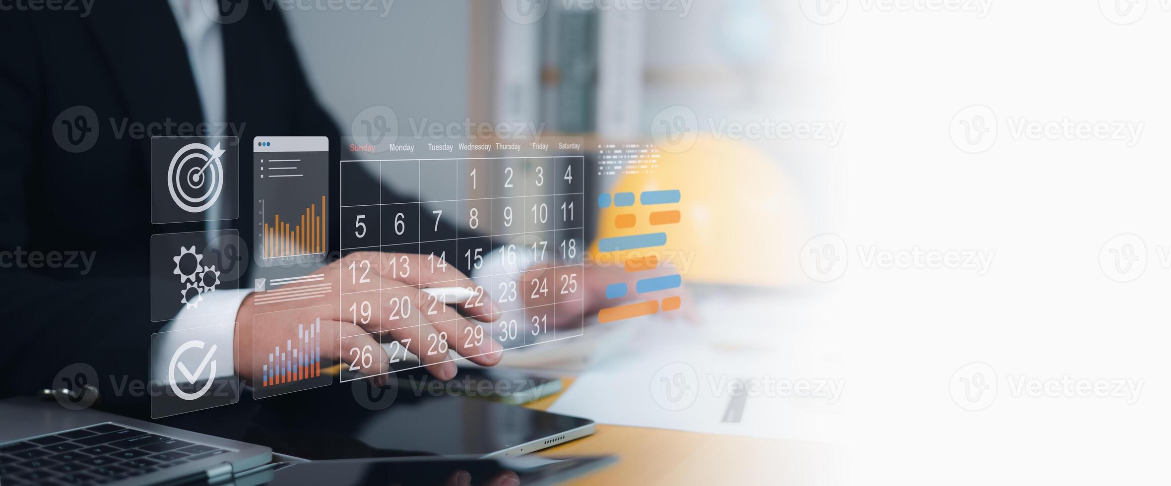 Businessman using futuristic digital calendar and data analytics dashboard on tablet, symbolizing business planning, project management, productivity, strategy, technology, and digital transformation. photo