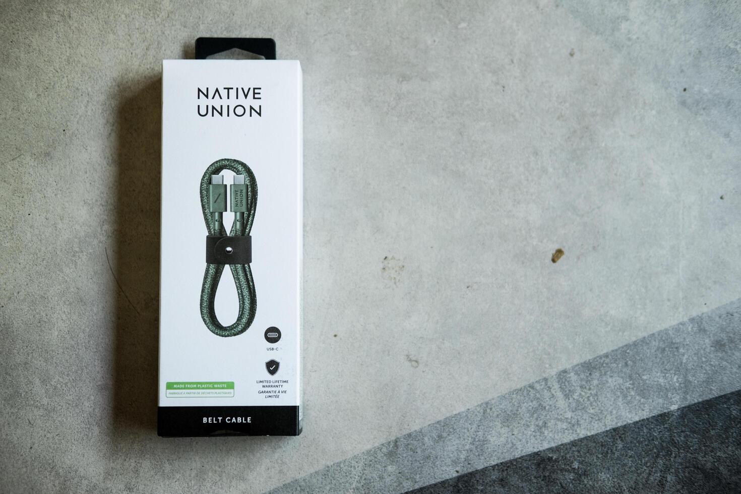 Bangkok, Thailand - July 6, 2025 Belt Cable, USB C to USB-C from Native union. The recycled 4-foot charging cable with bonded leather strap photo