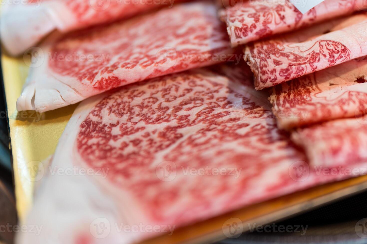 Dishes featuring thin slices of beef photo