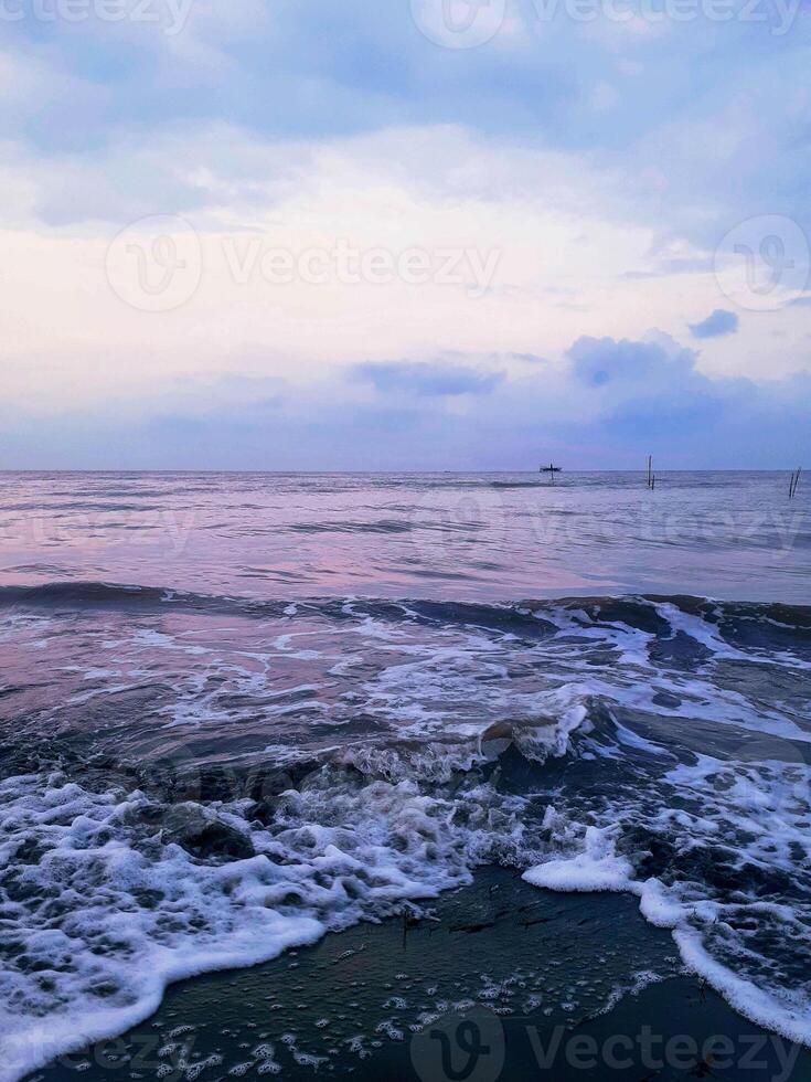 Tranquil Twilight Seascape Muted Hues and Gentle Waves photo