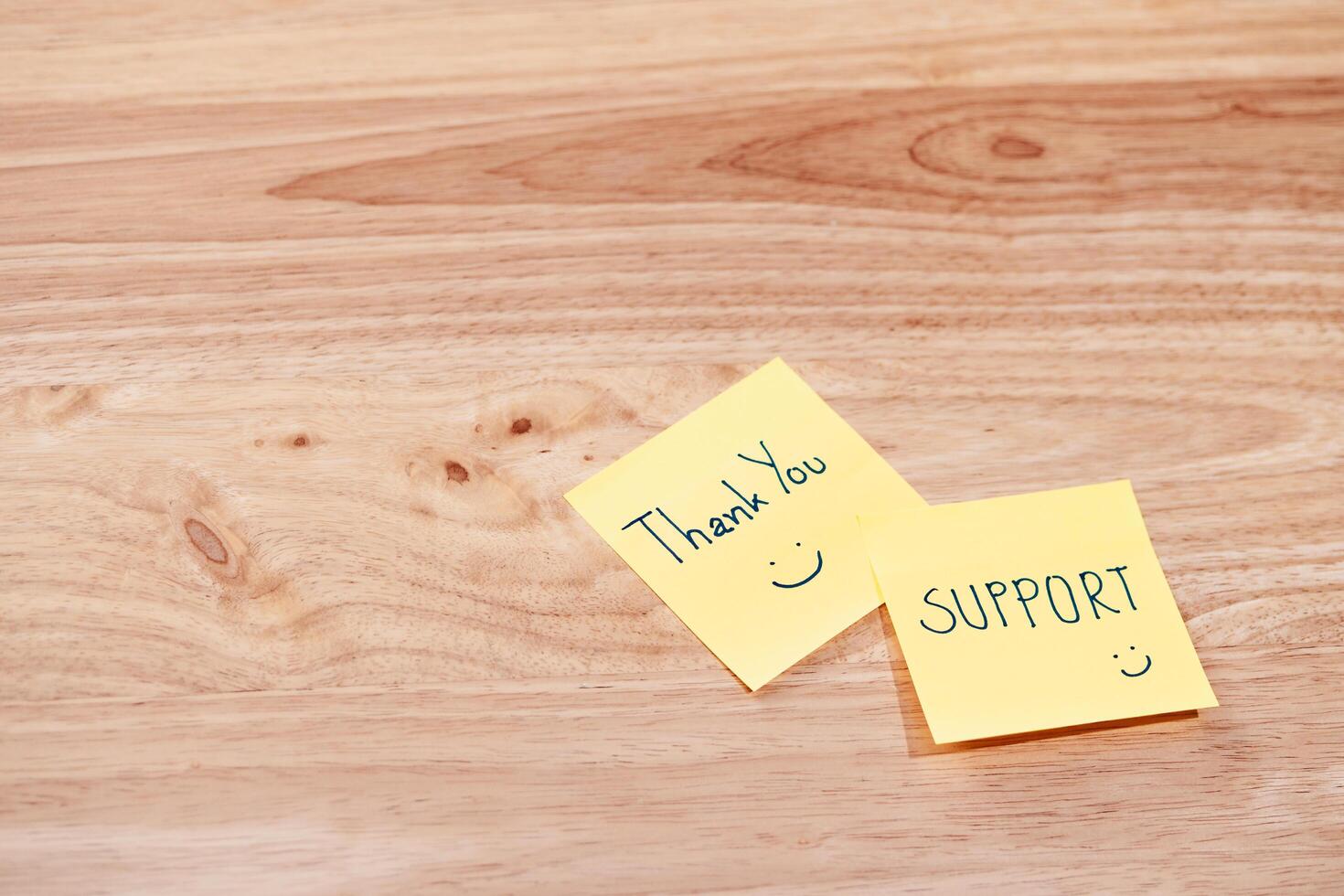 Thank you notes for support office desk warm environment close-up gratitude concept photo