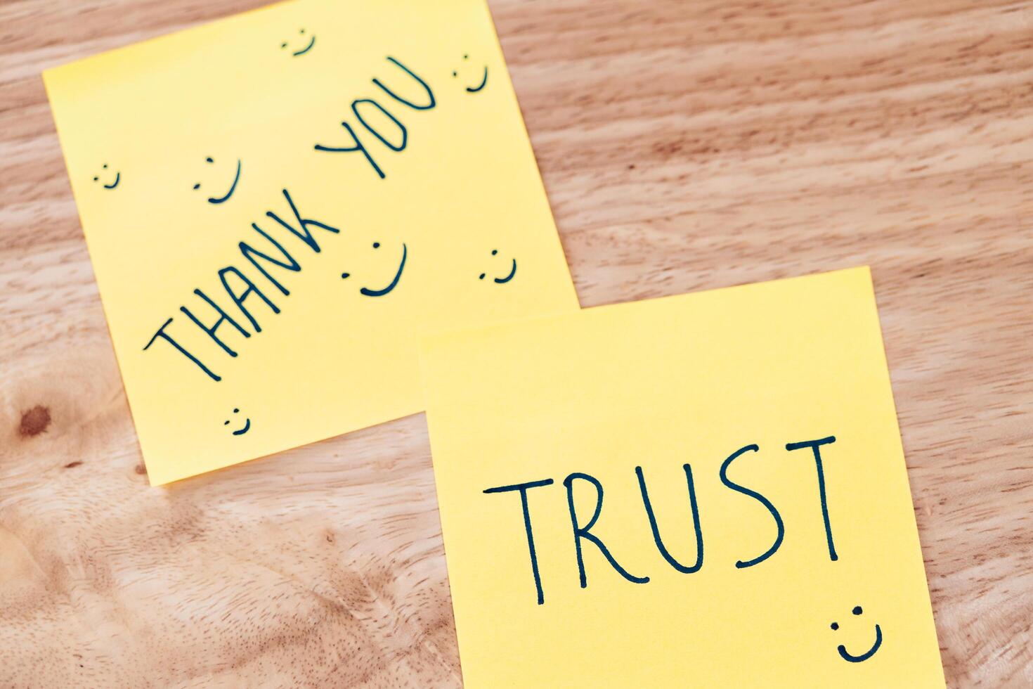 Expressing gratitude and trust positive messages sticky notes in a cozy workspace photo