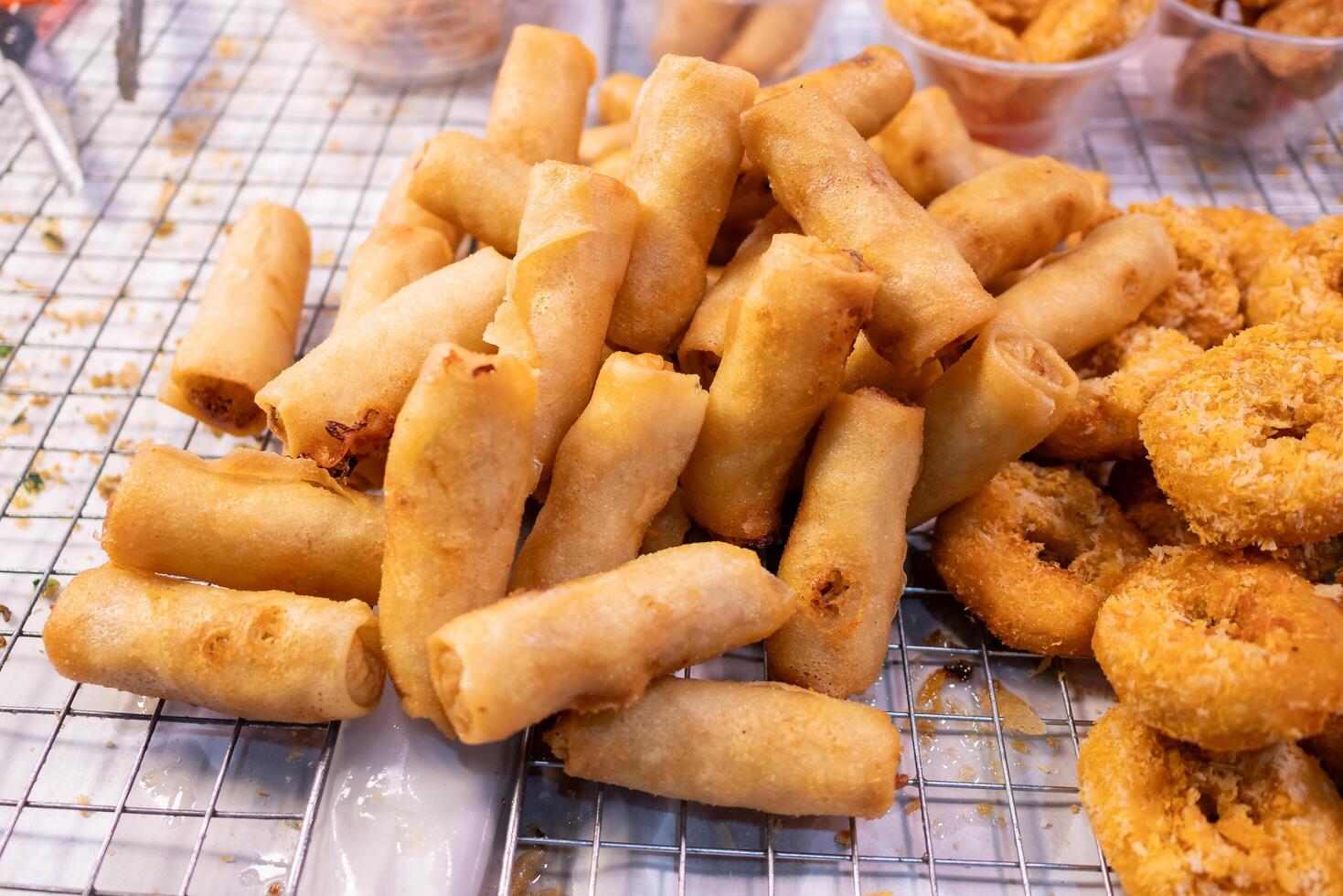 Delicious spring rolls street market food urban environment close-up culinary delight photo