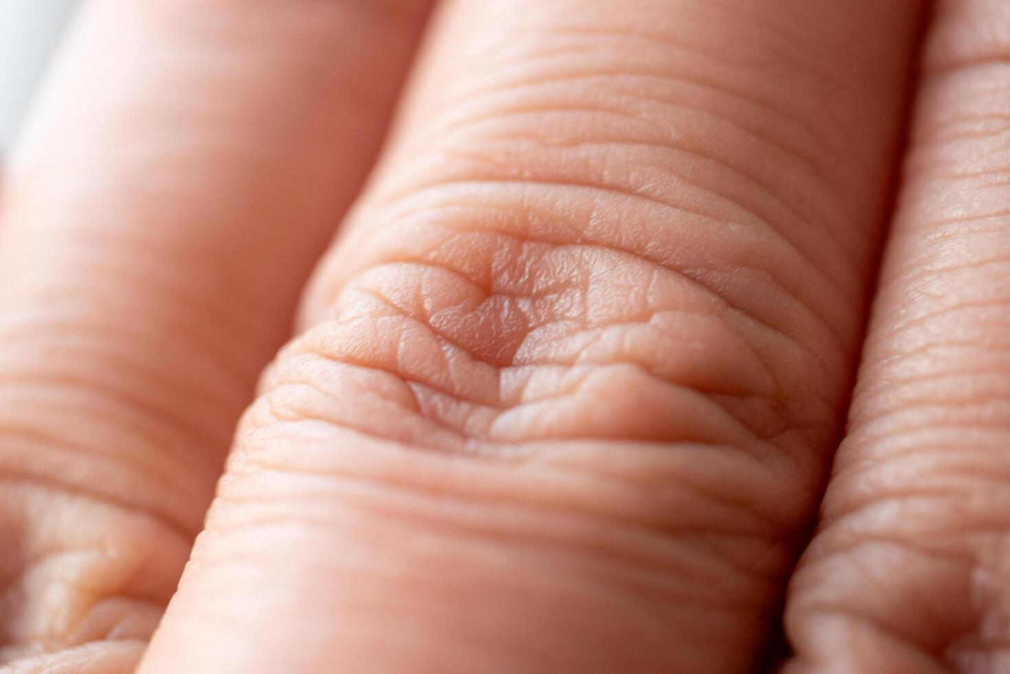 Captivating close-up of human skin texture macro indoor setting intimate perspective photo