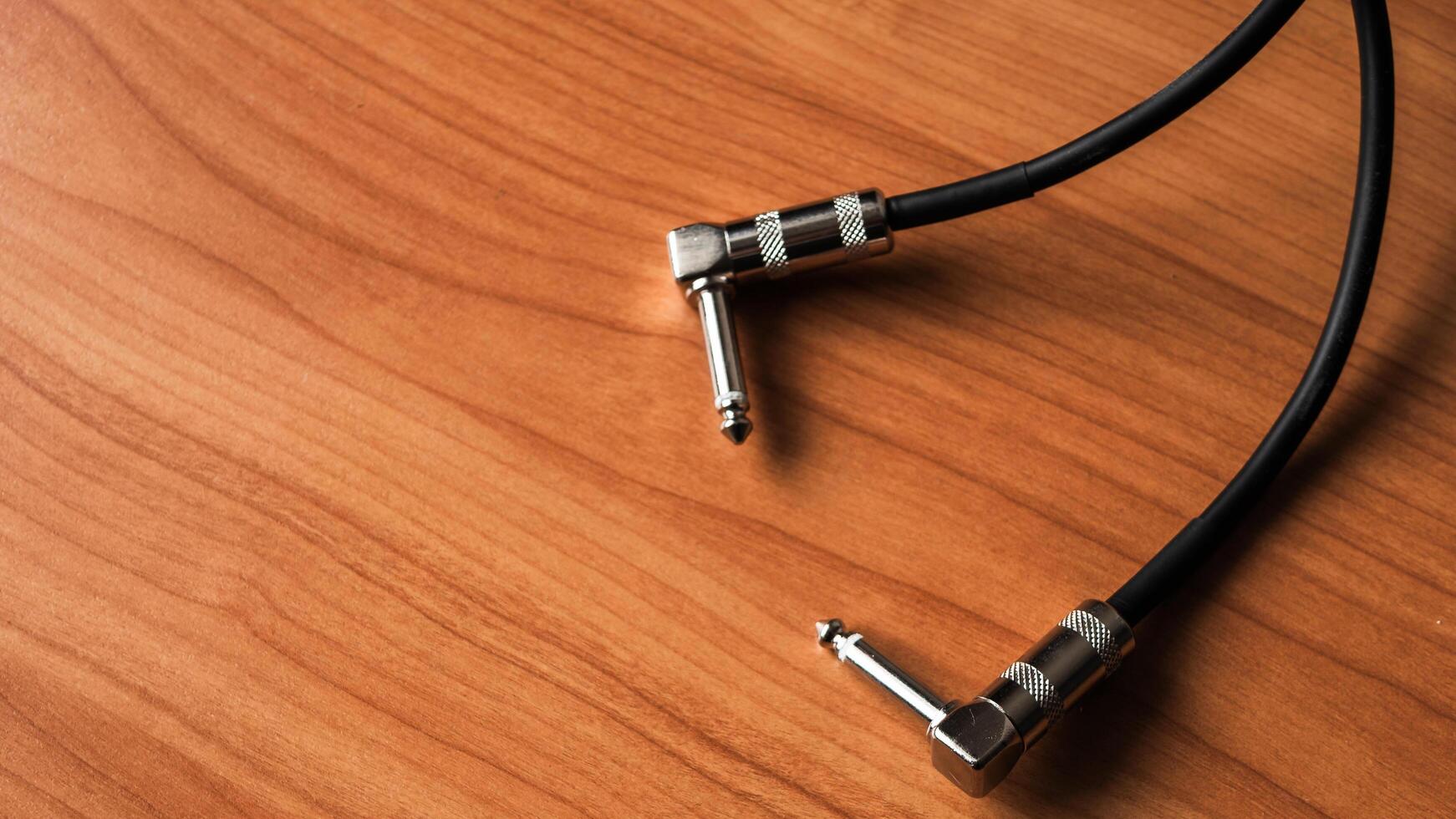 Audio equipment connection setup home studio wooden surface close-up musical creativity photo