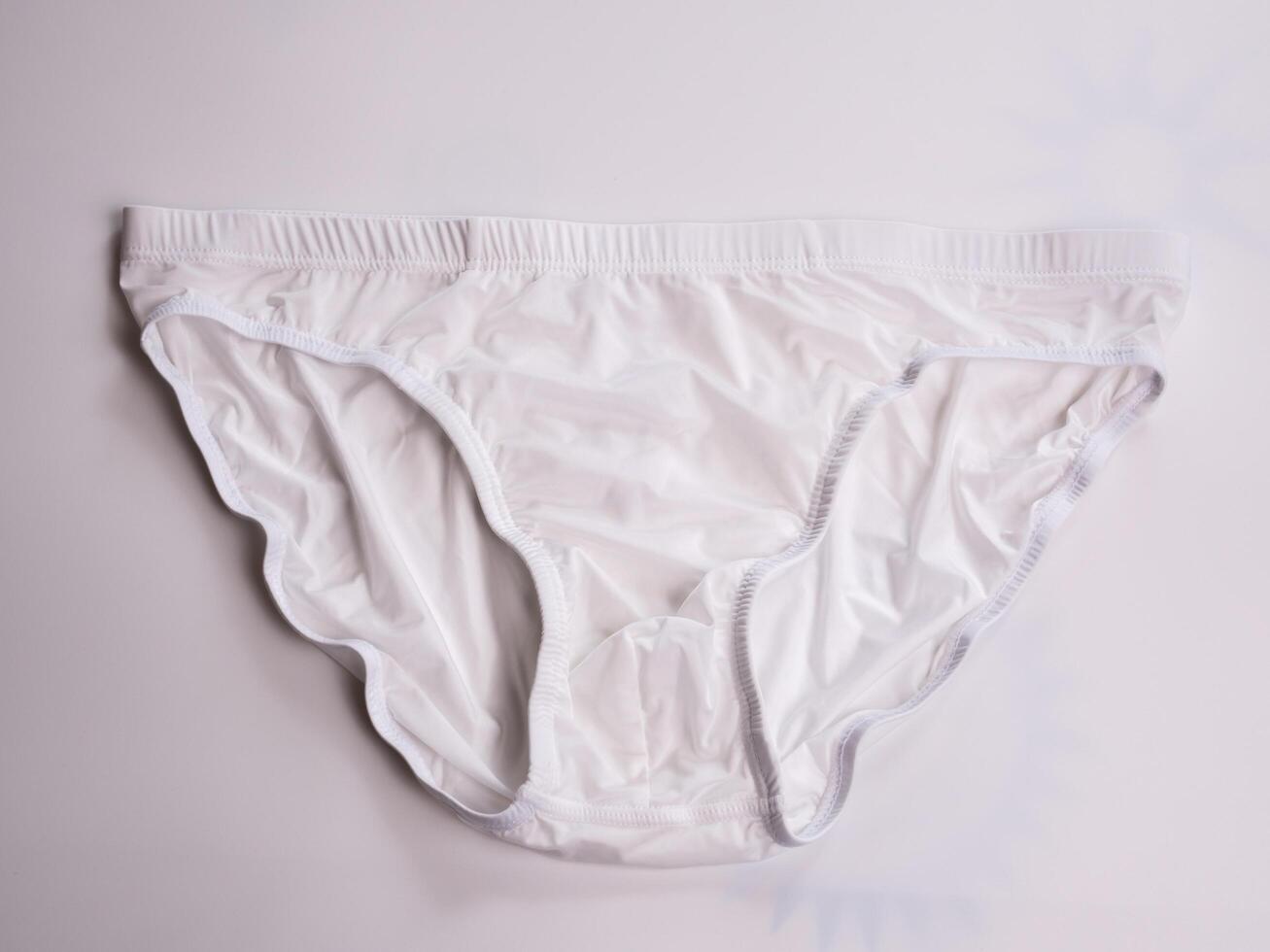 Fashion show featuring stylish white underwear studio setting product minimalist environment close-up view photo