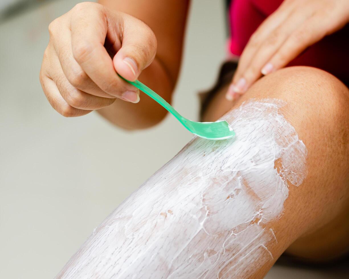 Hair removal process at home personal care image series indoor setting close-up view beauty tips photo