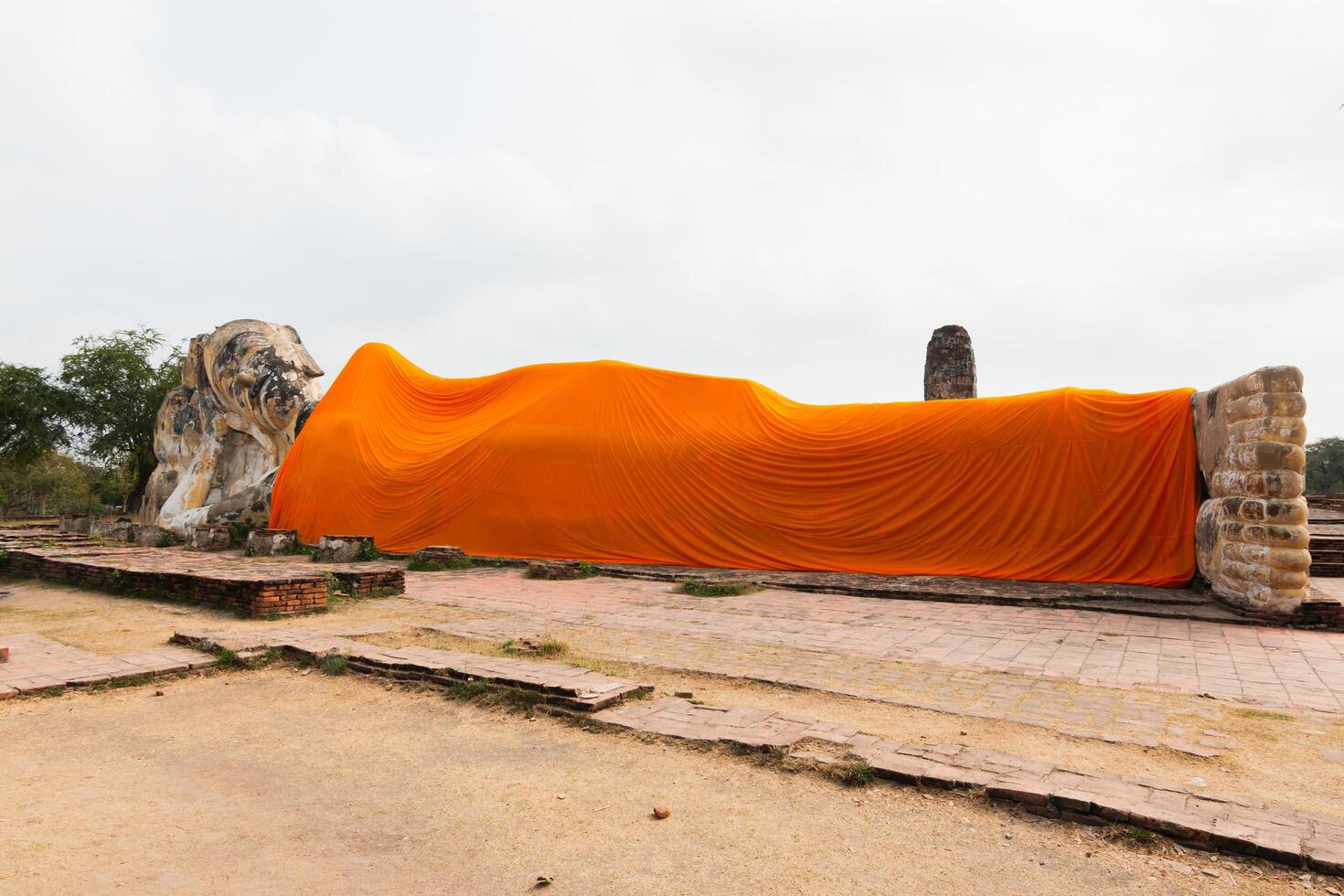 Reclining lion statue historical site archaeological outdoor setting ground level cultural heritage photo
