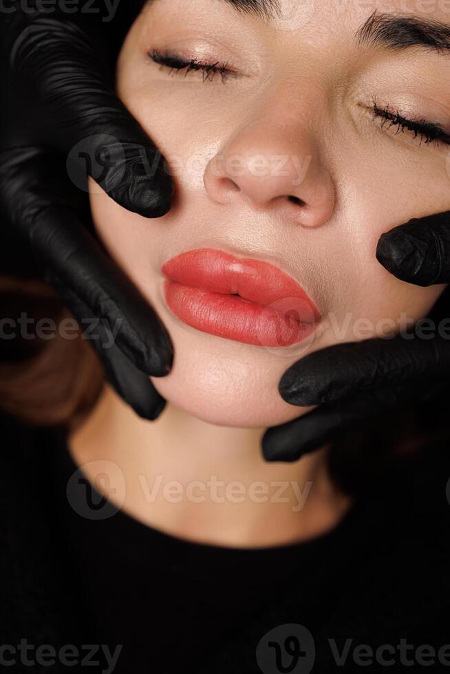 High-resolution image of precisely shaped lips and clear, natural surrounding skin. photo