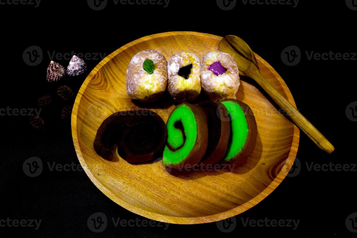A wooden plate with a plate of food on it photo