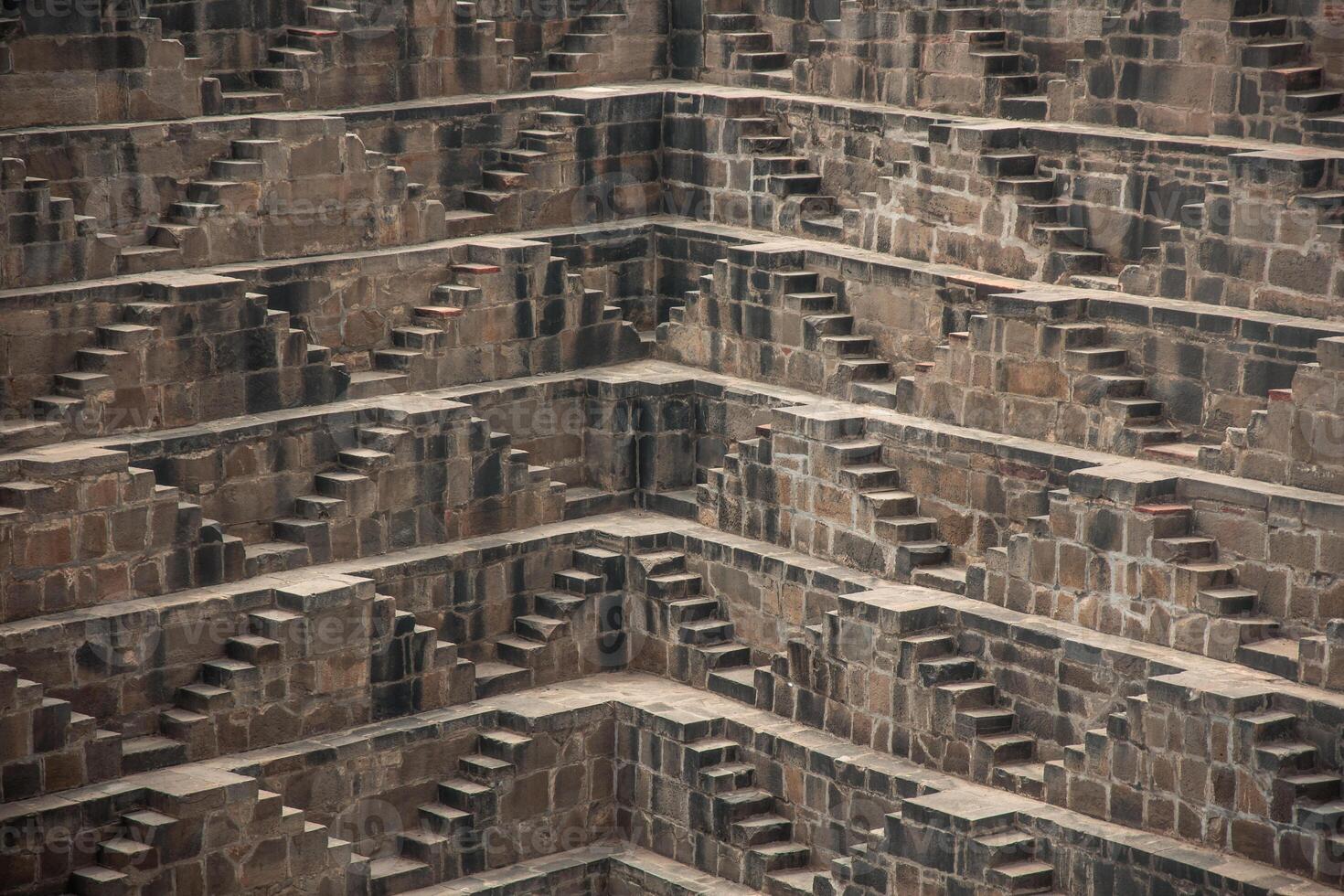 Exploring Chand Baori, impressive stepwell in Abhaneri, Rajasthan, India photo