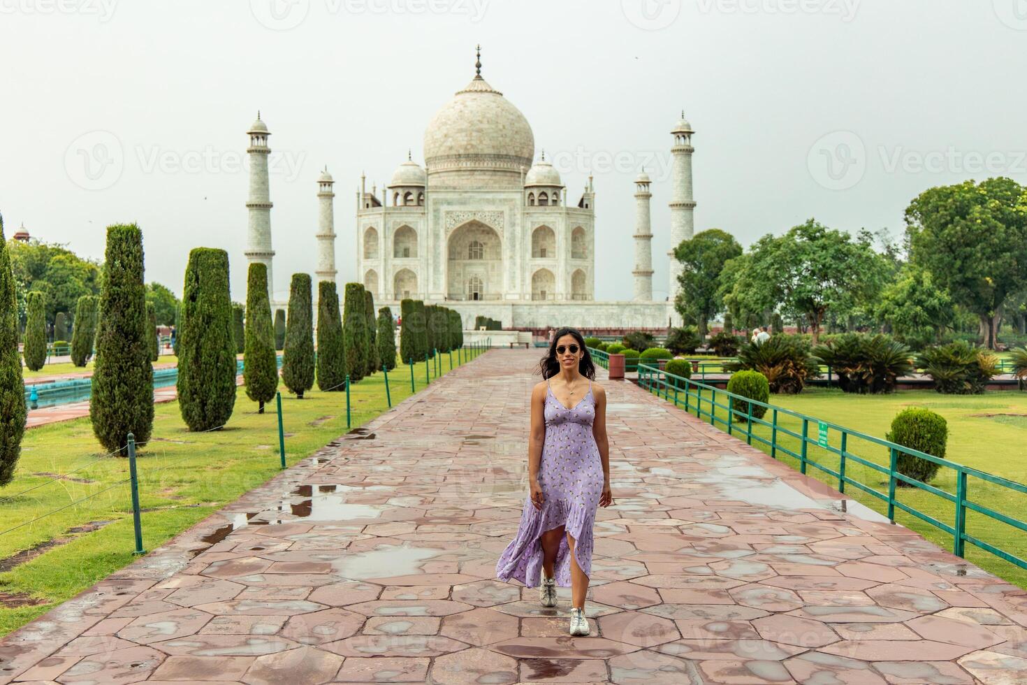 Tourist walking towards Taj Mahal in Agra, India photo