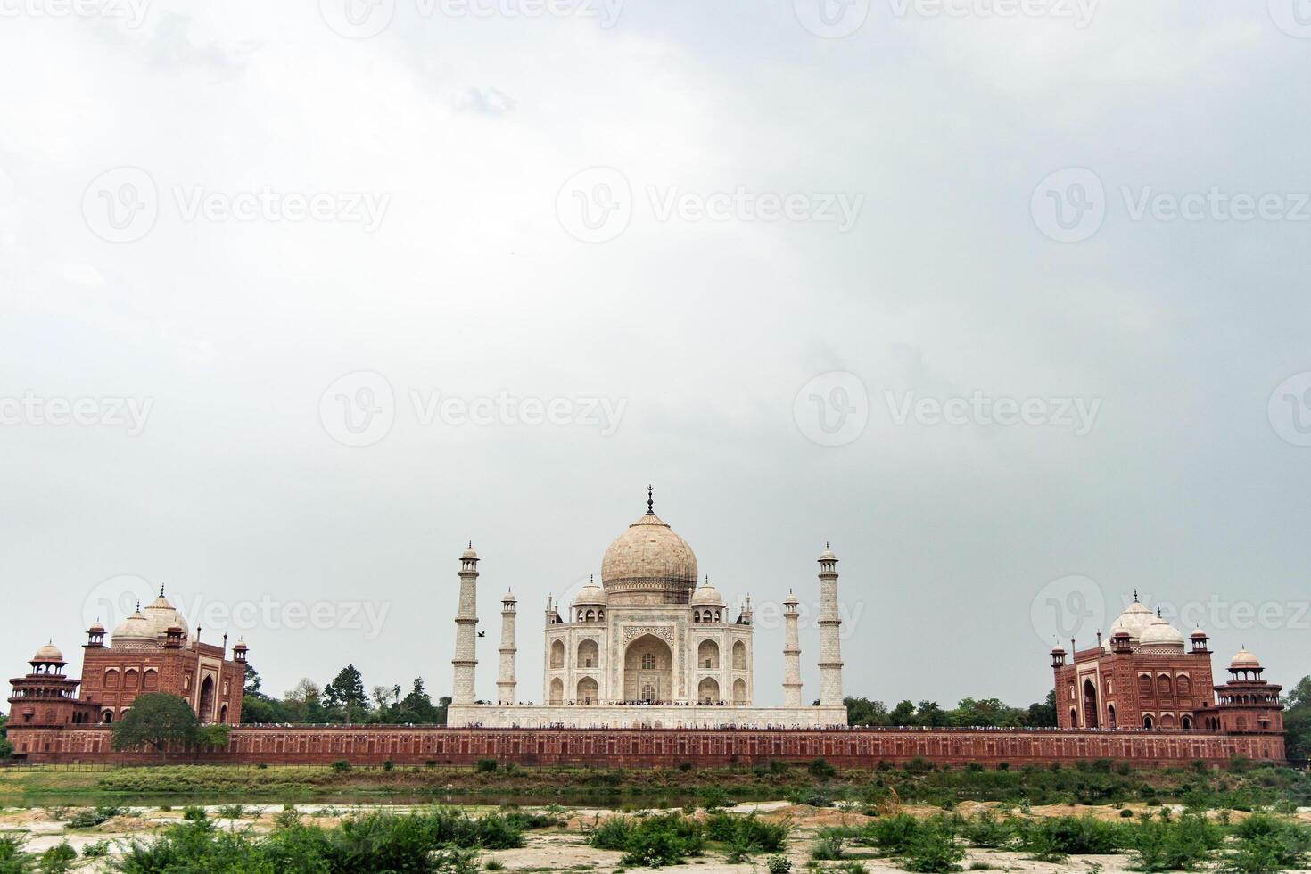 Taj Mahal standing majestically on the banks of Yamuna river, Agra, India photo