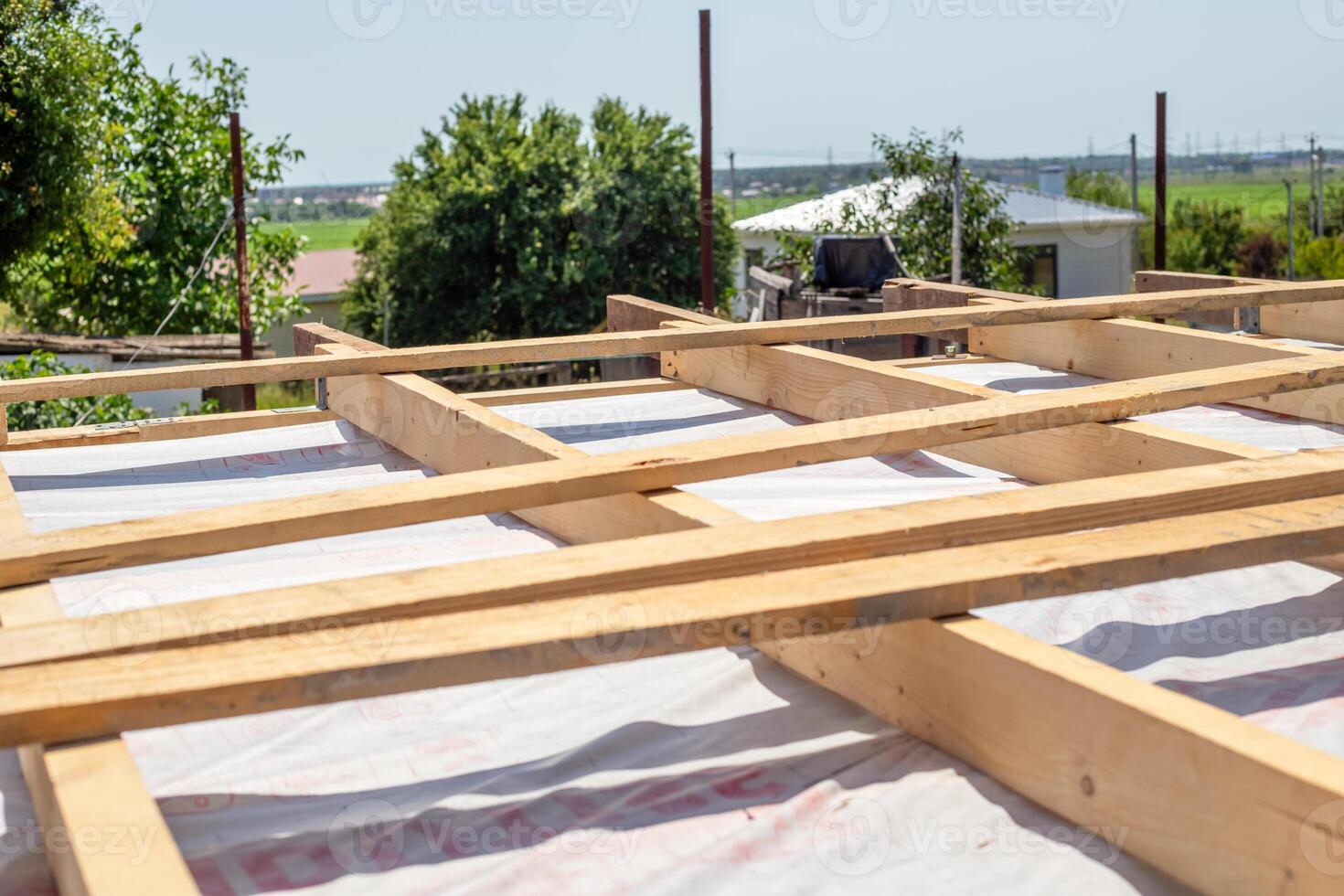 The timber roof frame of the building is under construction, structural support photo
