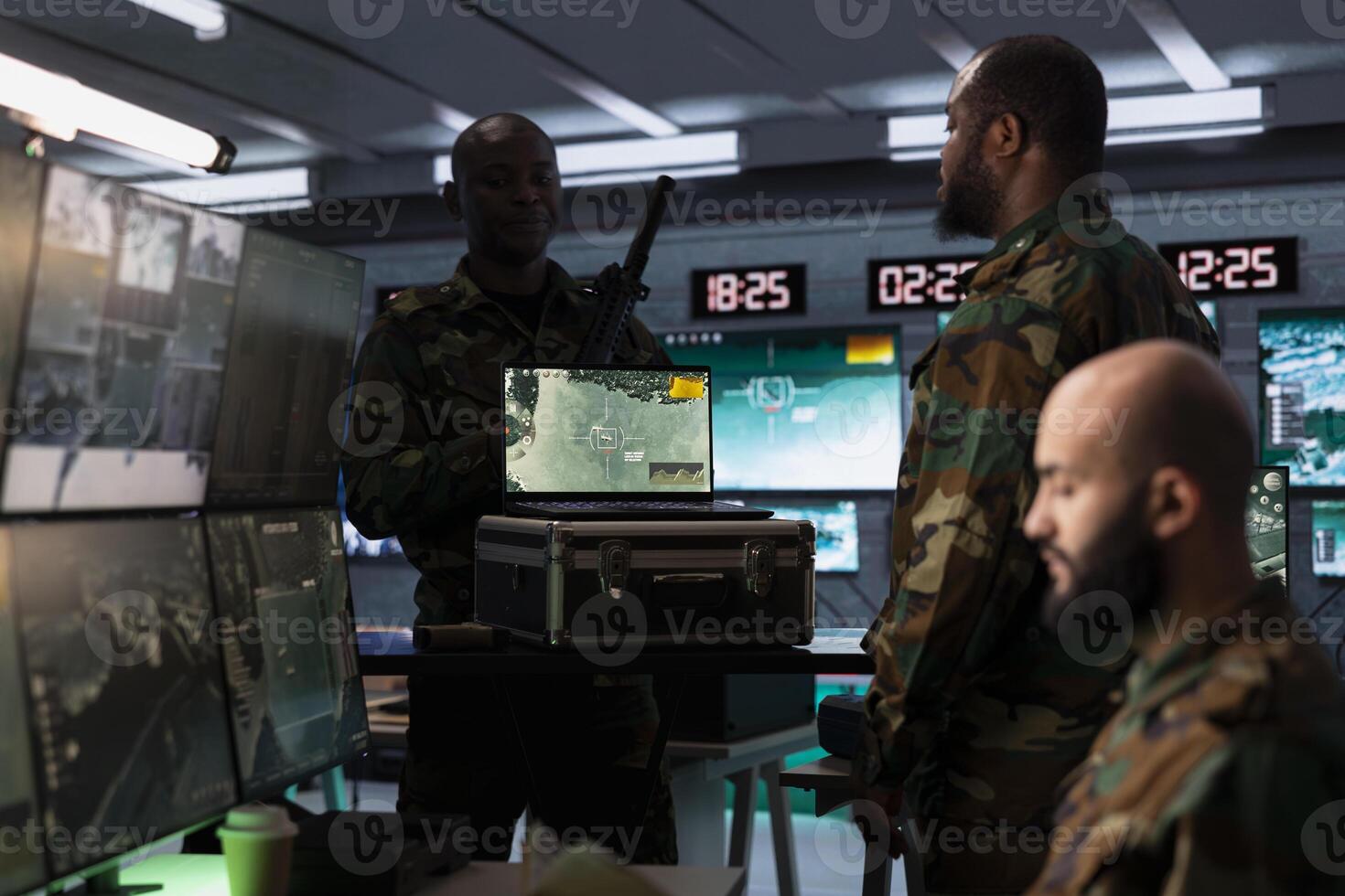 Air defense specialist using radar on laptop to detect missile attacks and conducting space surveillance and satellite tracking. Army expert using military software on notebook preventing rockets photo