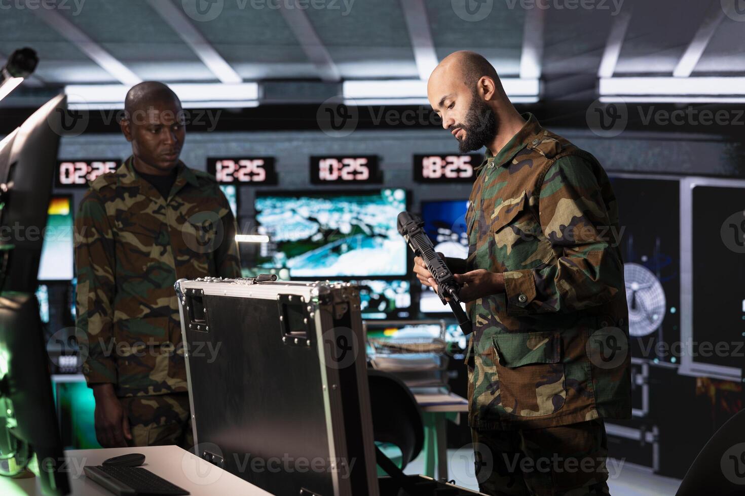 Army solders packing weapons able to engage targets at extended range with accurate, lethal fire. Military units loading guns with bullets, preparing to start mission to suppress enemy photo